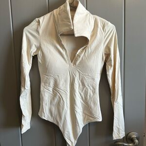 White Long Sleeve V-Neck Bodysuit with Asymmetrical Cut Out